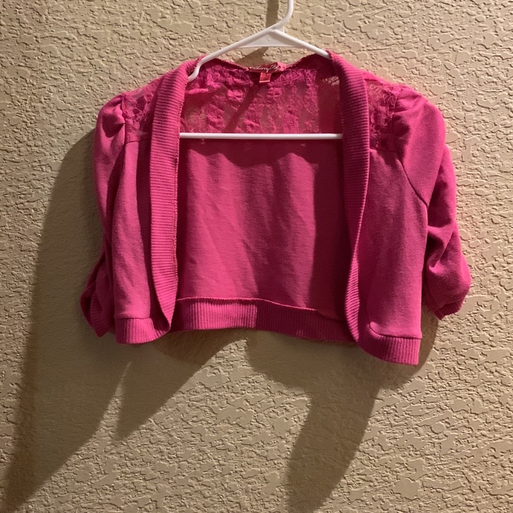 A cute shrug in the brand cherry stix